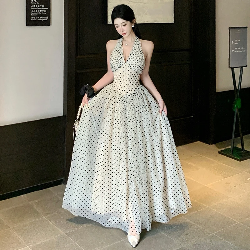 法式高级感波点鱼骨束腰挂脖连衣裙女收腰大摆长裙子到脚踝超长款