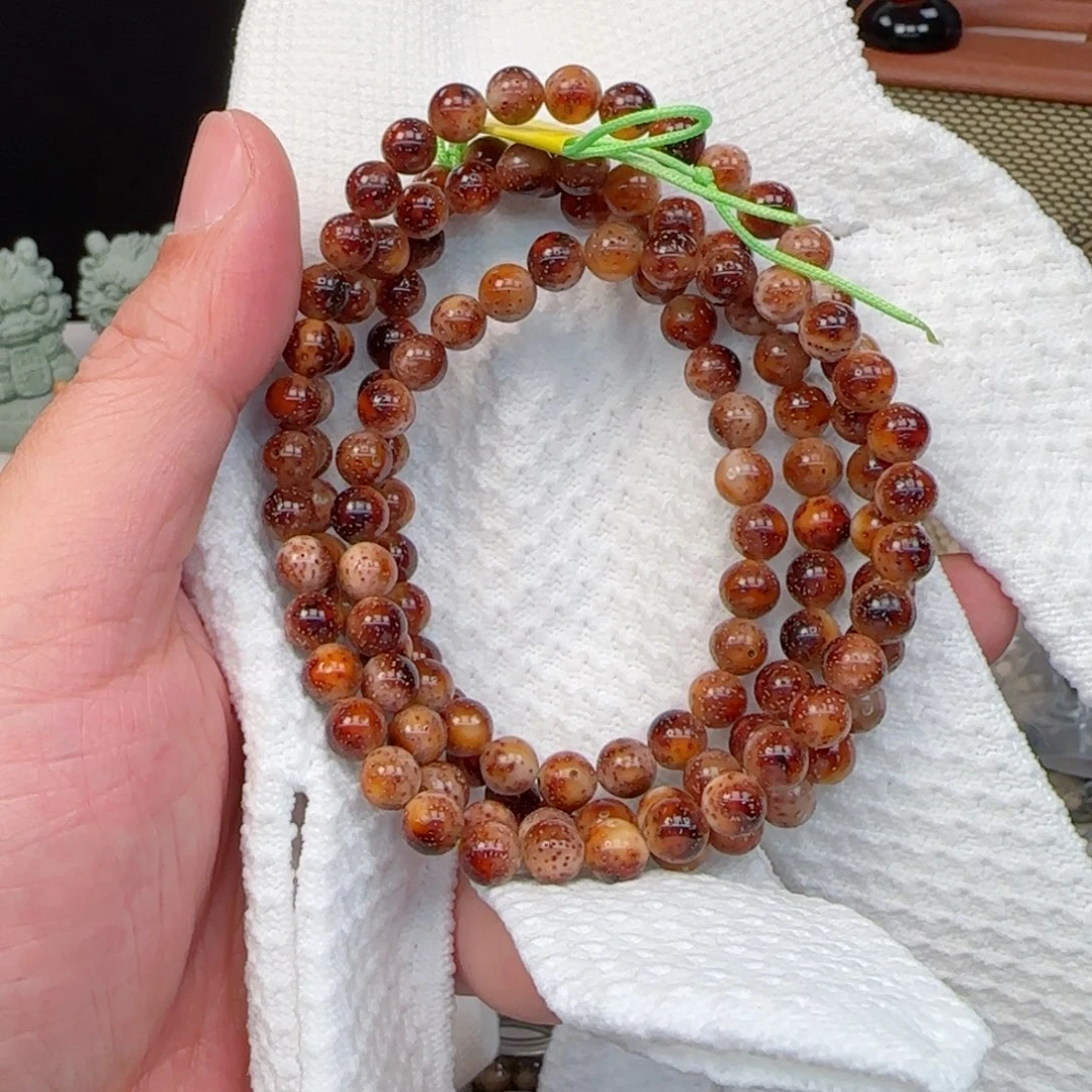 星月菩提手串陈籽火烧云108-7mm圆