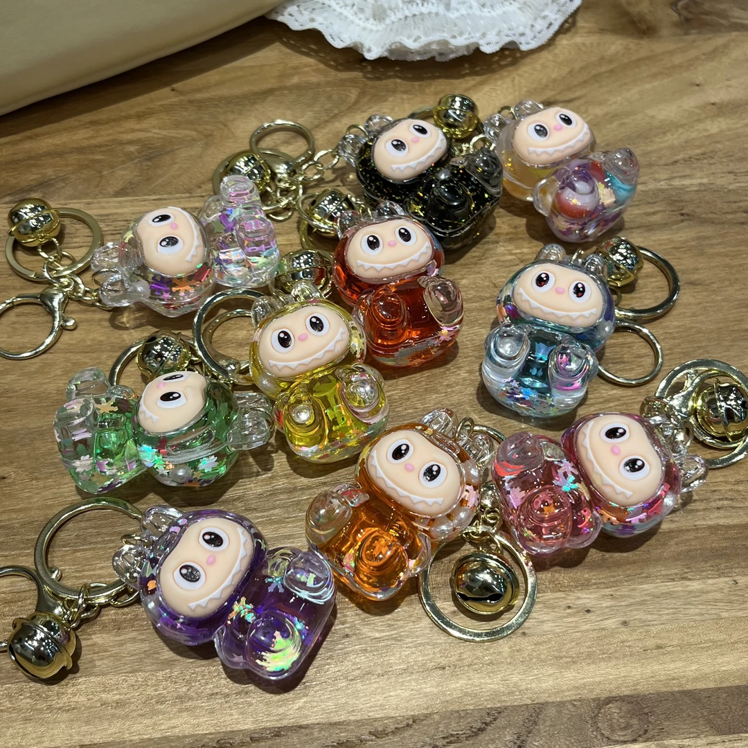 【拍1发2】创意卡通公仔钥匙扣流沙入油公仔亚克力少女包包挂饰挂件