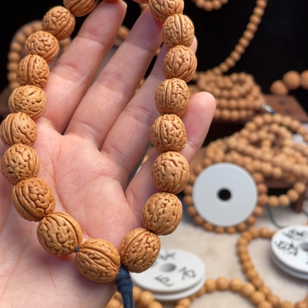 *****桃核吊坠桃核手持盘锦野生钱袋龙蛋