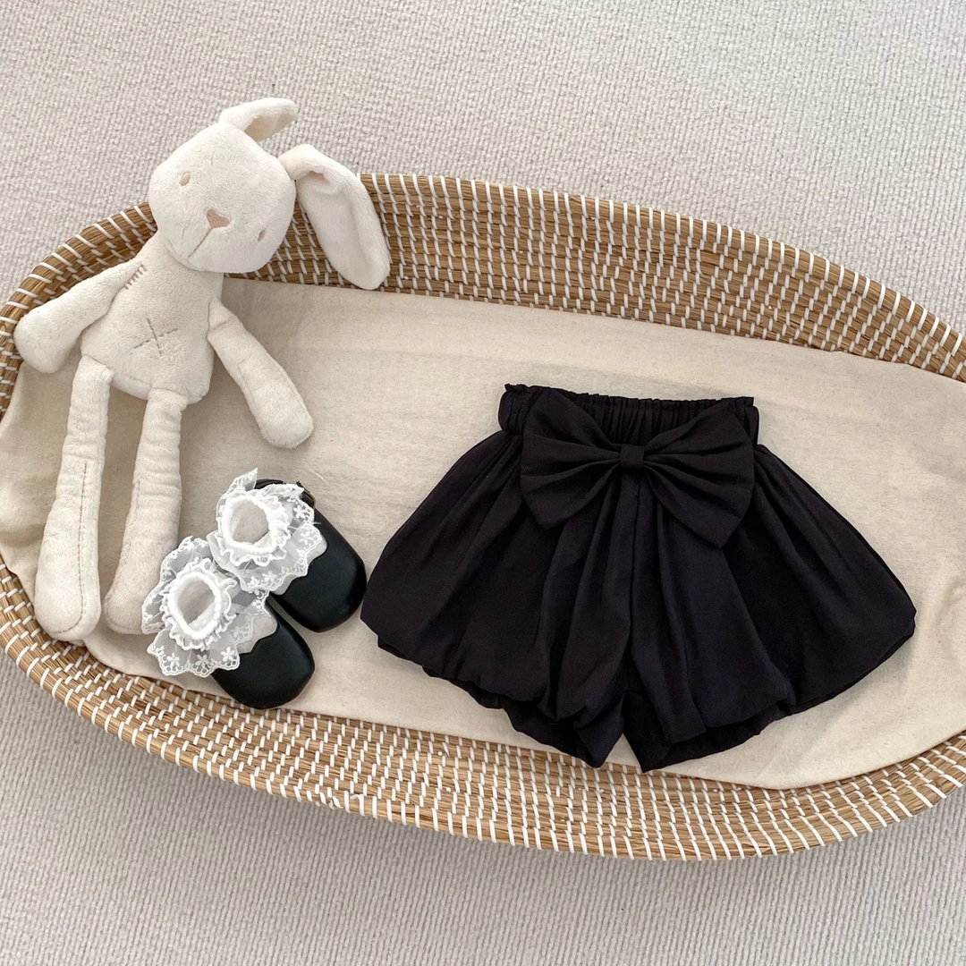 黑色蝴蝶结花苞短款a6