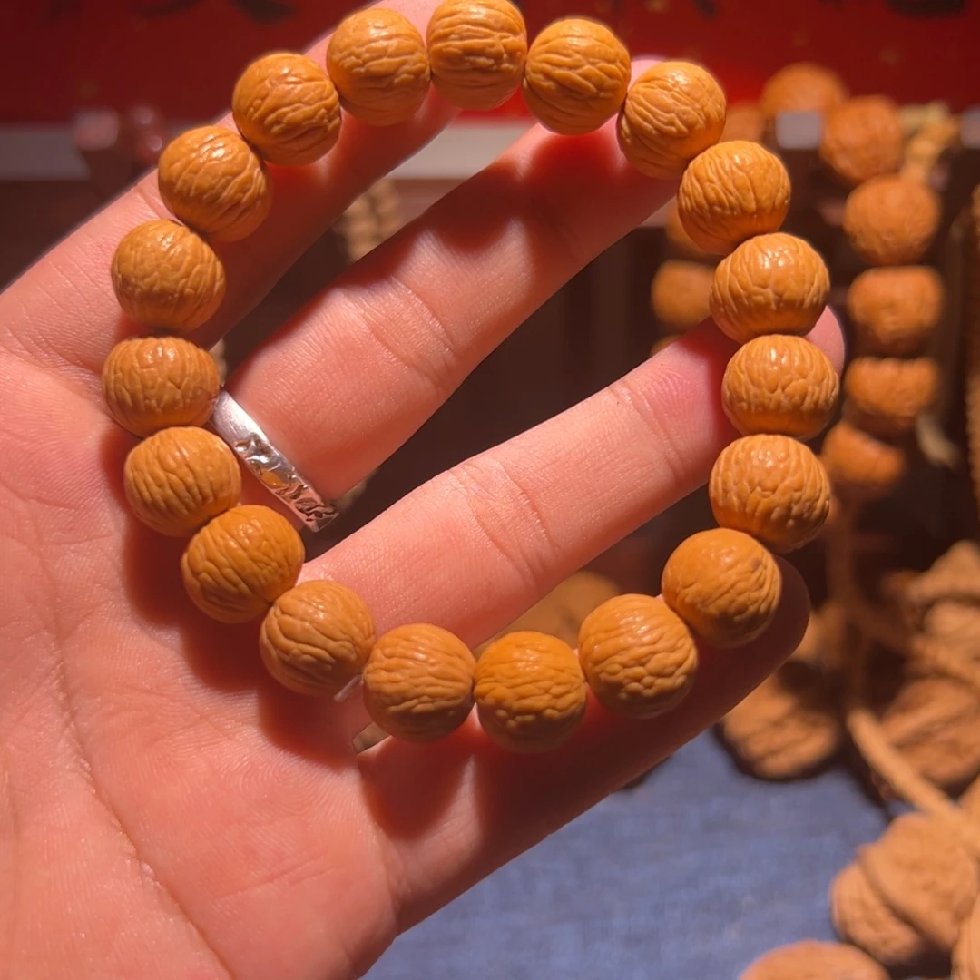 文玩核桃把件12-13原皮原色猴头小凤羽