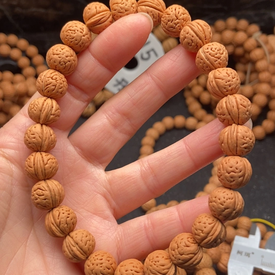 钓***菜野生桃核手串元宝肚肌肉纹12尺全品