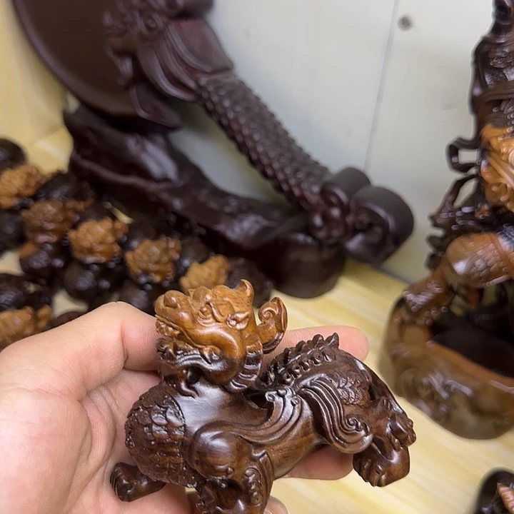 木黑檀木10金钱貔貅一只双色
