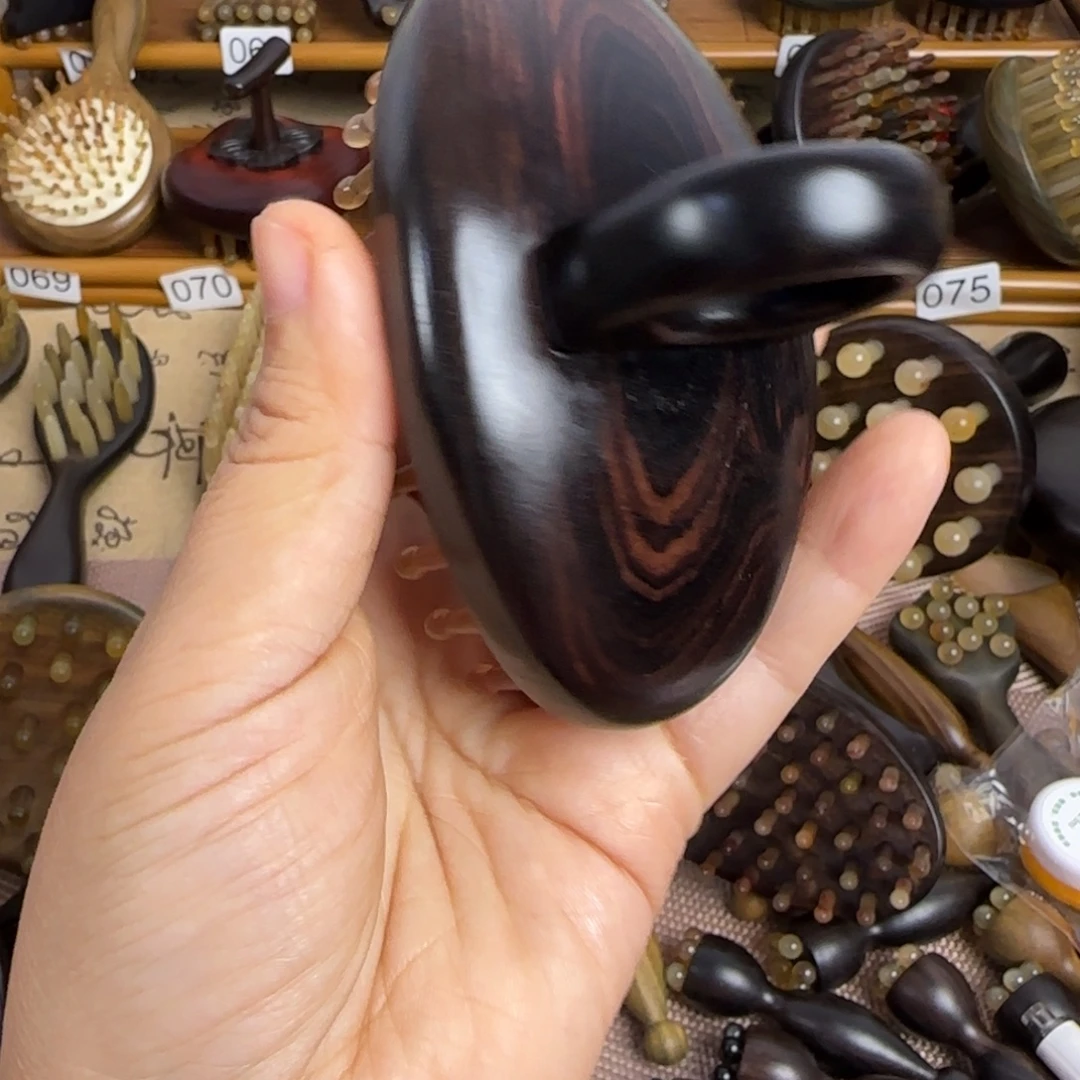 紫光檀小船56齿按摩梳