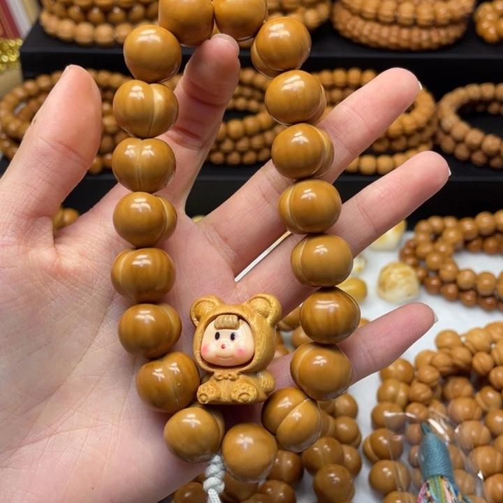 灭***太猴头核桃吊坠二等屁桃加娃娃配饰