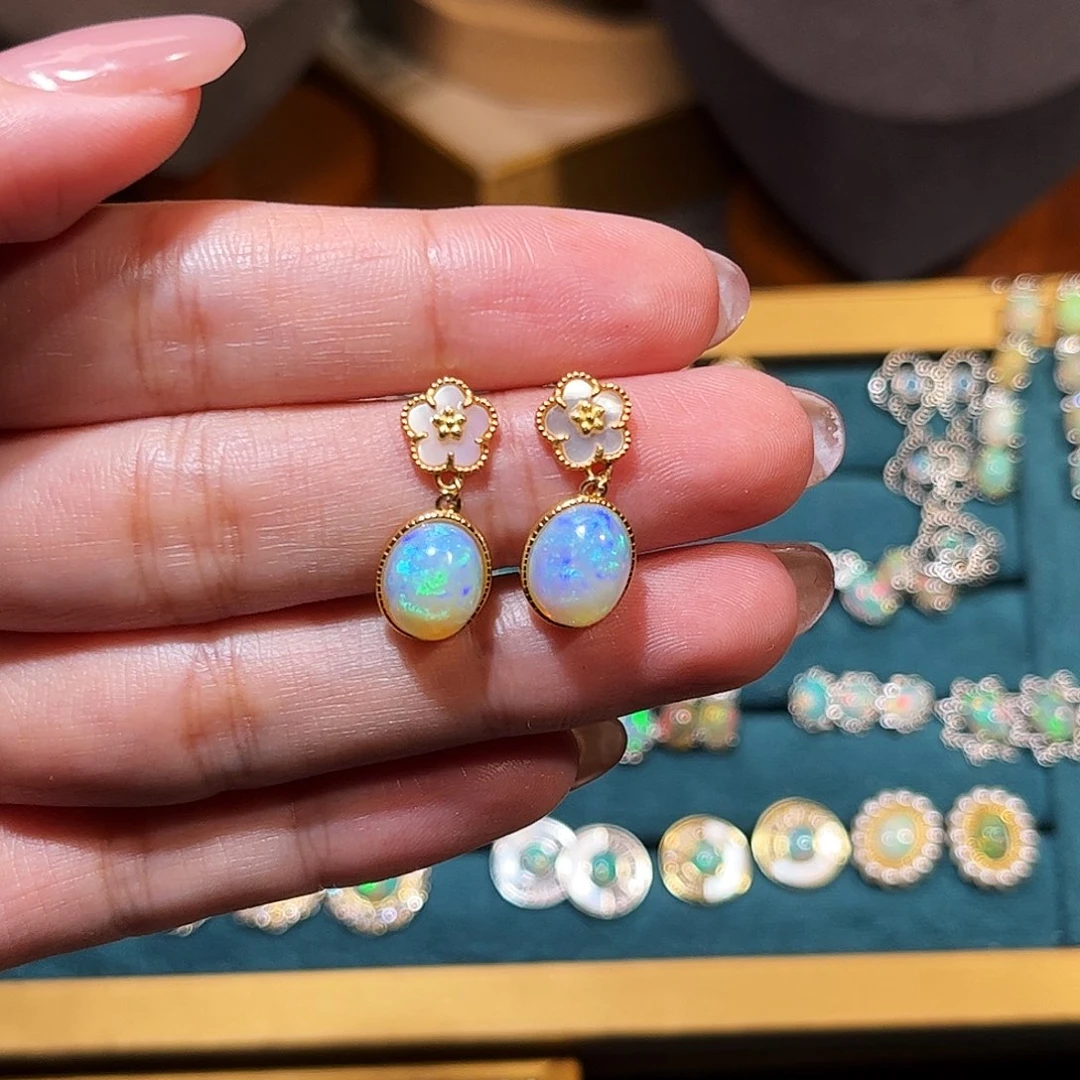 小***儿银S925镶嵌欧泊耳钉）