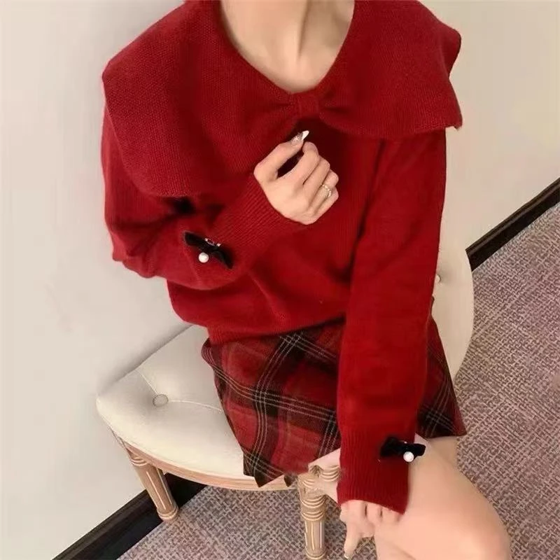 独特漂亮蝴蝶结红色毛衣女款2025新款春秋宽松设计感针织上衣秋冬