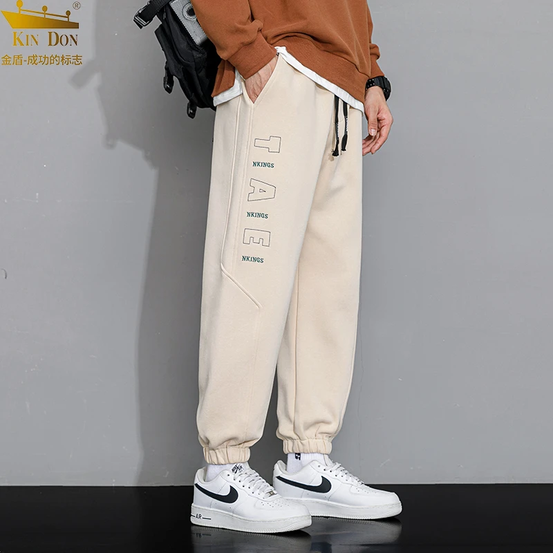 金盾裤子男款春秋季新款男士宽松潮流刺绣休闲长裤青少年运动卫裤