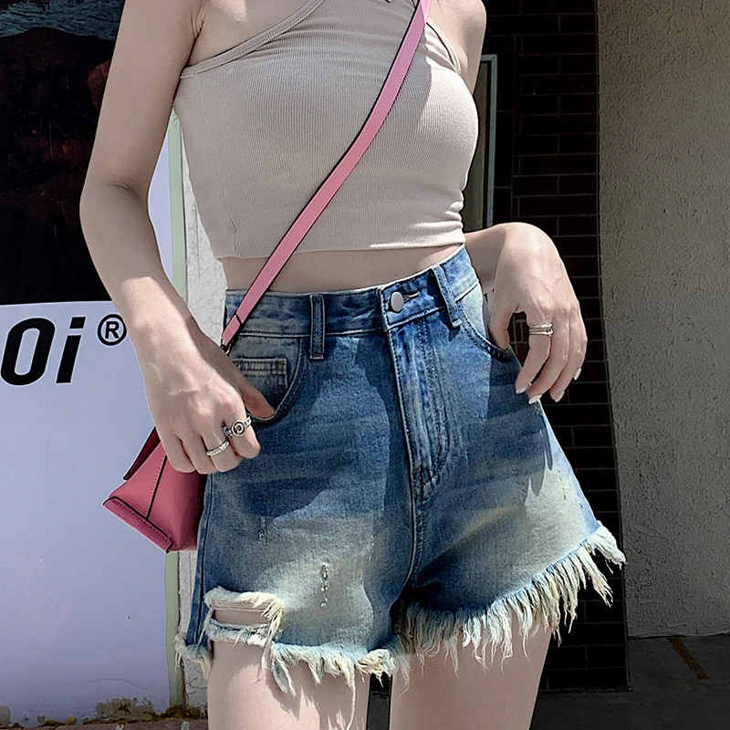 牛仔短裤女2025夏季韩版毛边修身显瘦A字阔腿破洞水洗磨白设计感
