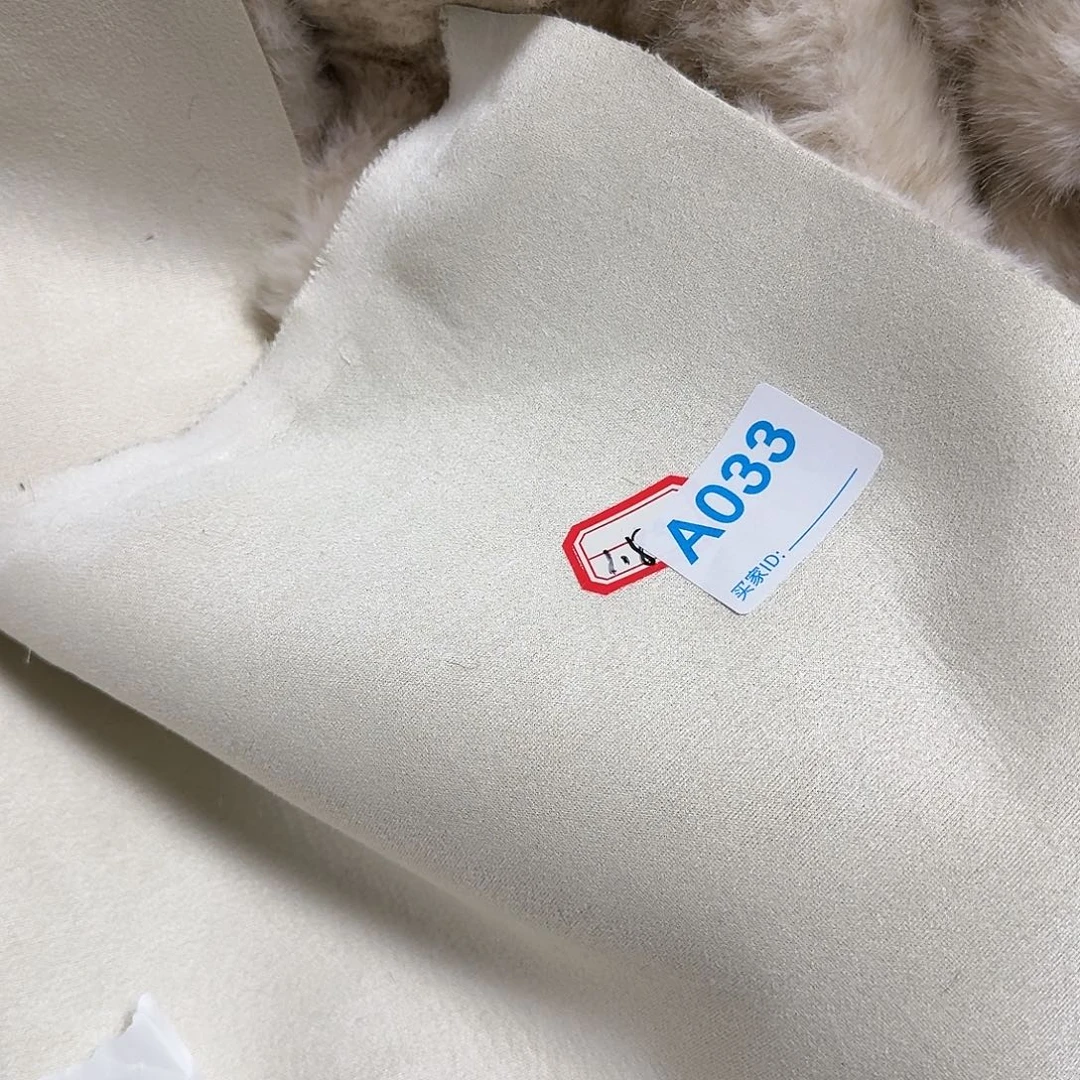 艾***希奶茶色皮毛一体35元033