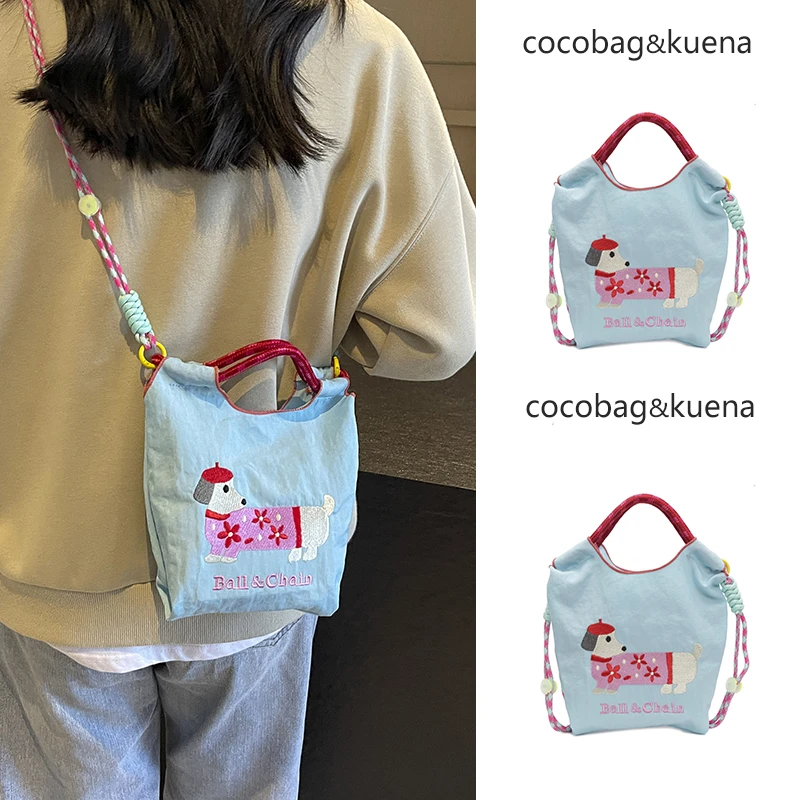 夏天夏季可爱腊肠狗帆布水桶包包女2025新款手提斜挎包刺绣包