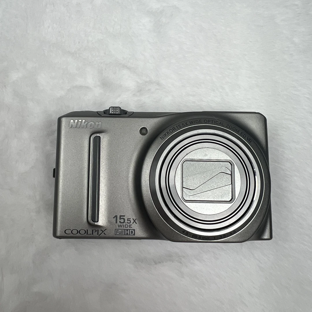95新 Nikon/尼康 S9050银色1602w像素15.5倍光变人像飞机均可拍