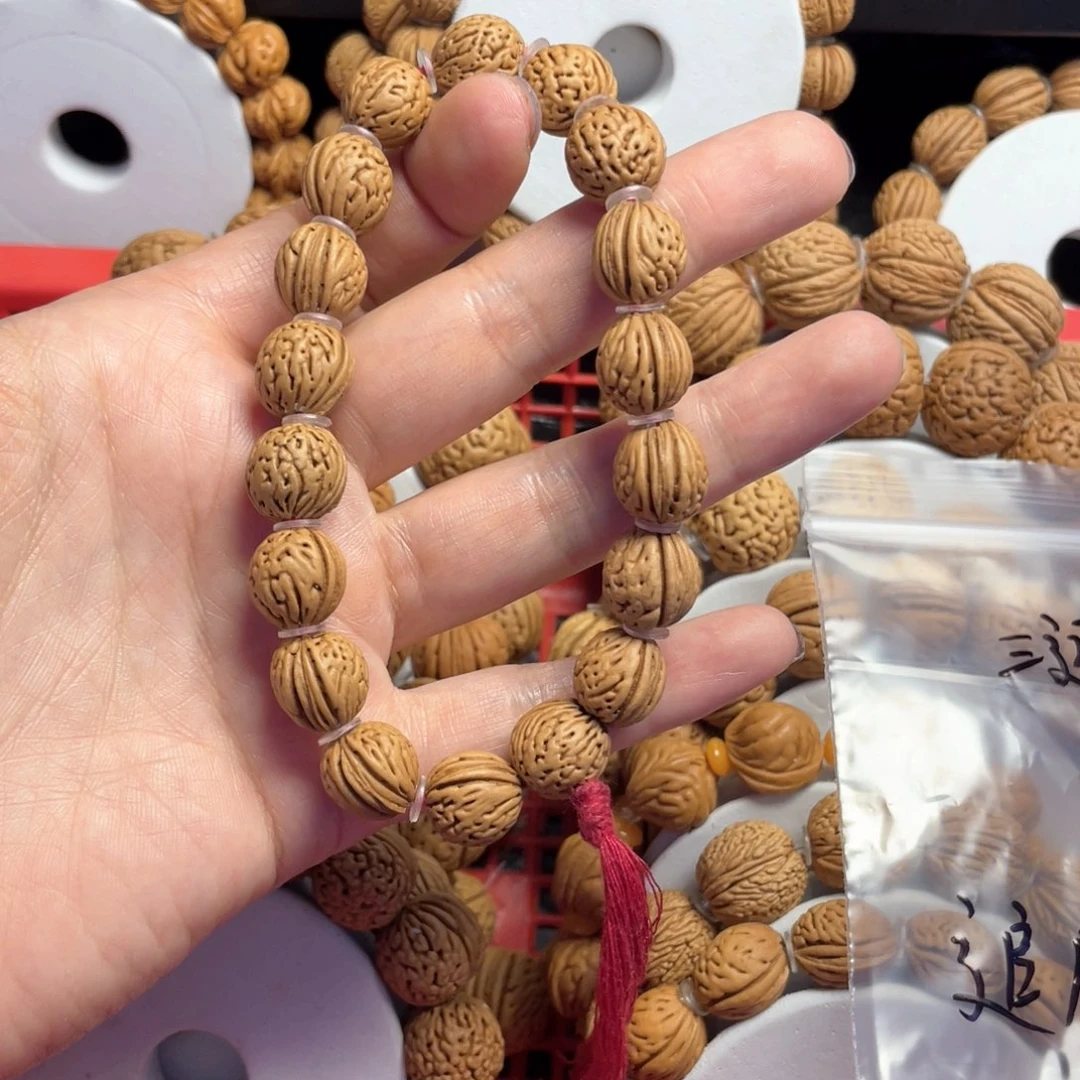 桃木追****留桃核手串12+野生小金豆子