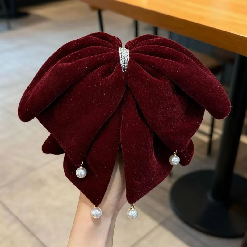 丝绒抓夹女2025秋冬新年款过年红色蝴蝶结发饰高级感后脑勺马尾夹