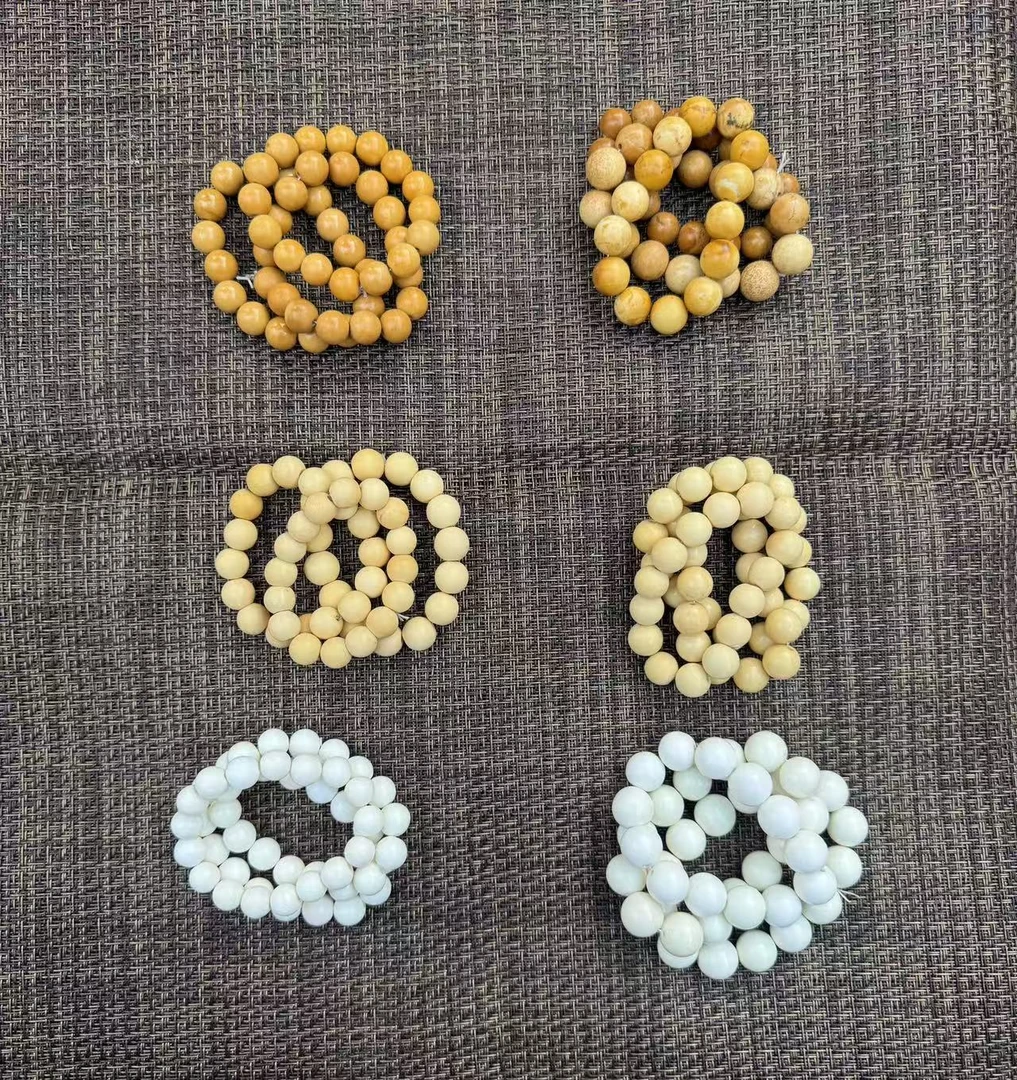 西藏丁青县琼布丁青像牙玉小佛珠念珠手串圆珠