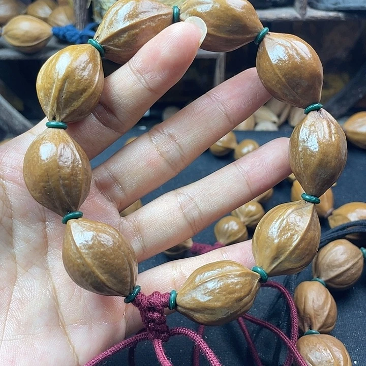 ?***笑广东梅林铁核橄榄核手串20x 29