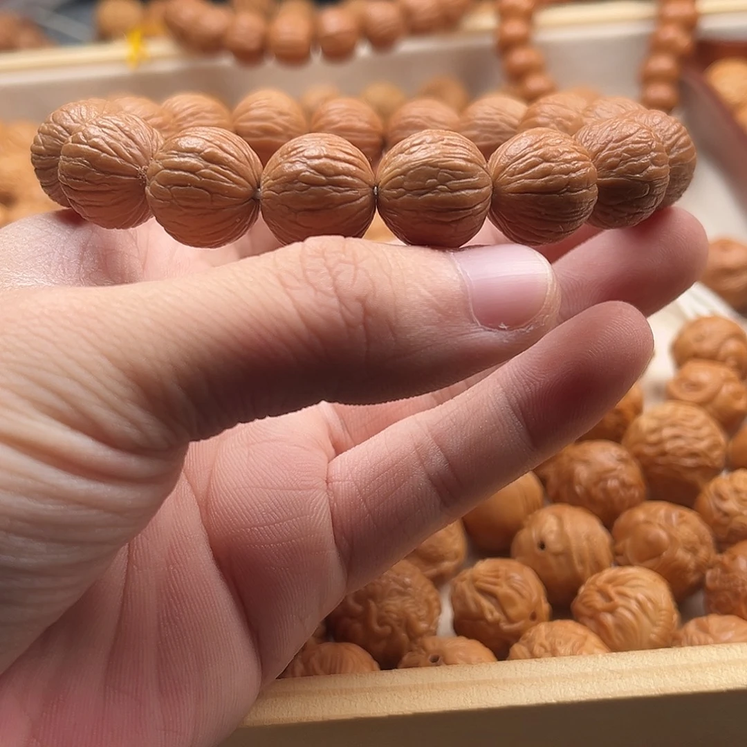 玉***常猴头核桃手串原皮14凤羽