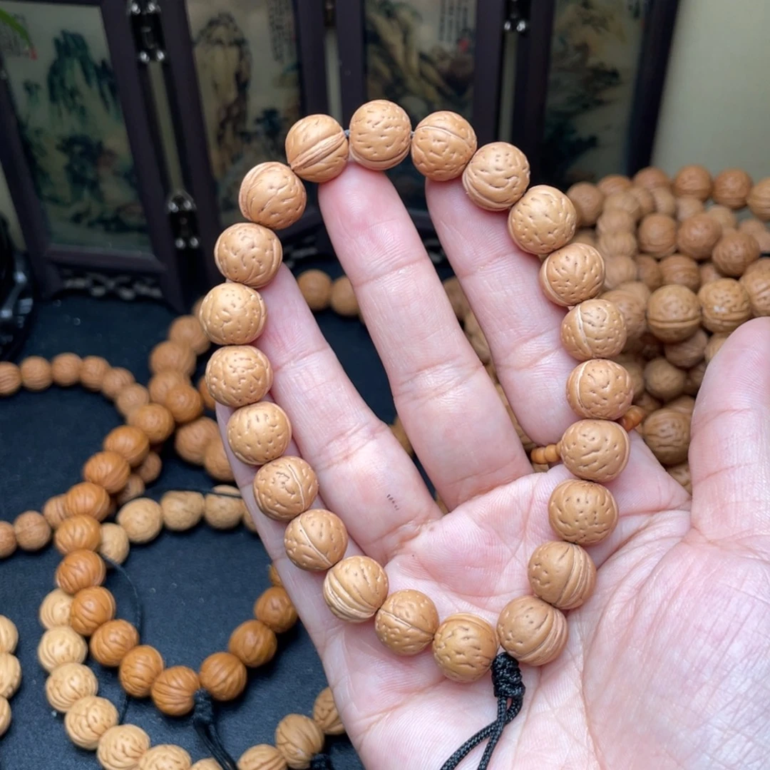 九***月11加野生光头强桃核手持