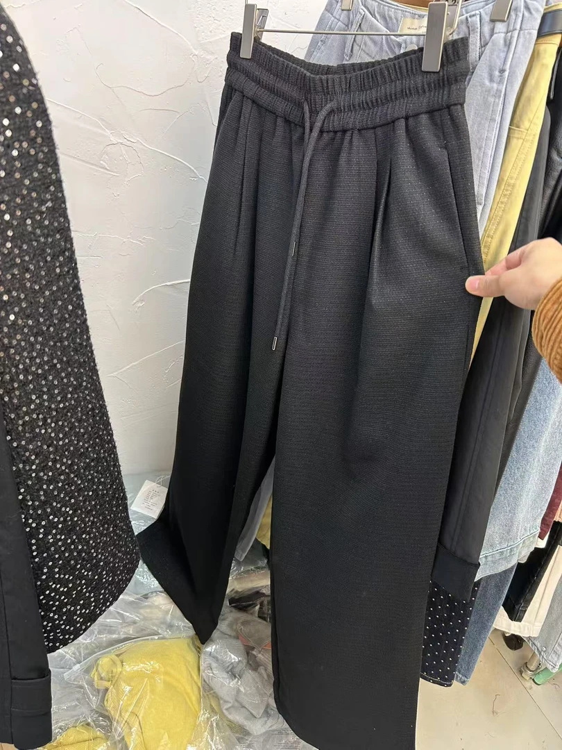 深圳南油春夏新款 很好看的带亮丝感觉的卫裤休闲裤