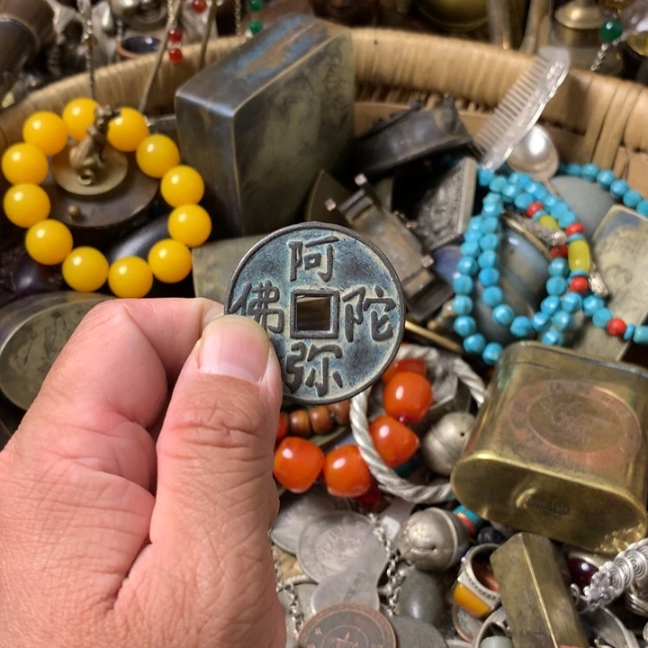 明***钓一物一拍阿弥陀佛