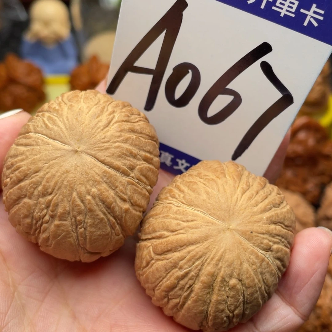 桃核把件金丝猴头39