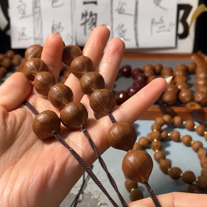 橄榄核手串8161精品蒜头铁核鸡血红12+1颗