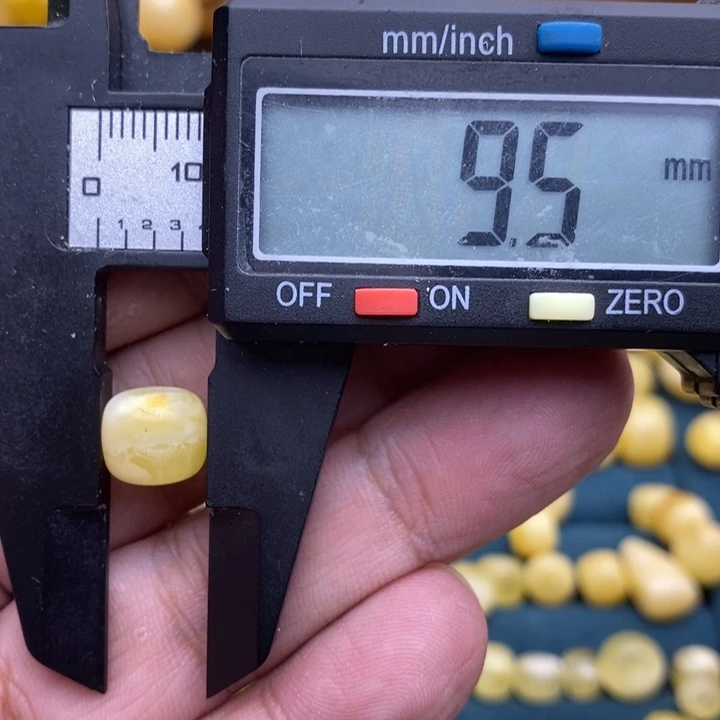琥珀未镶嵌裸石33号9.5*8.4微瑕