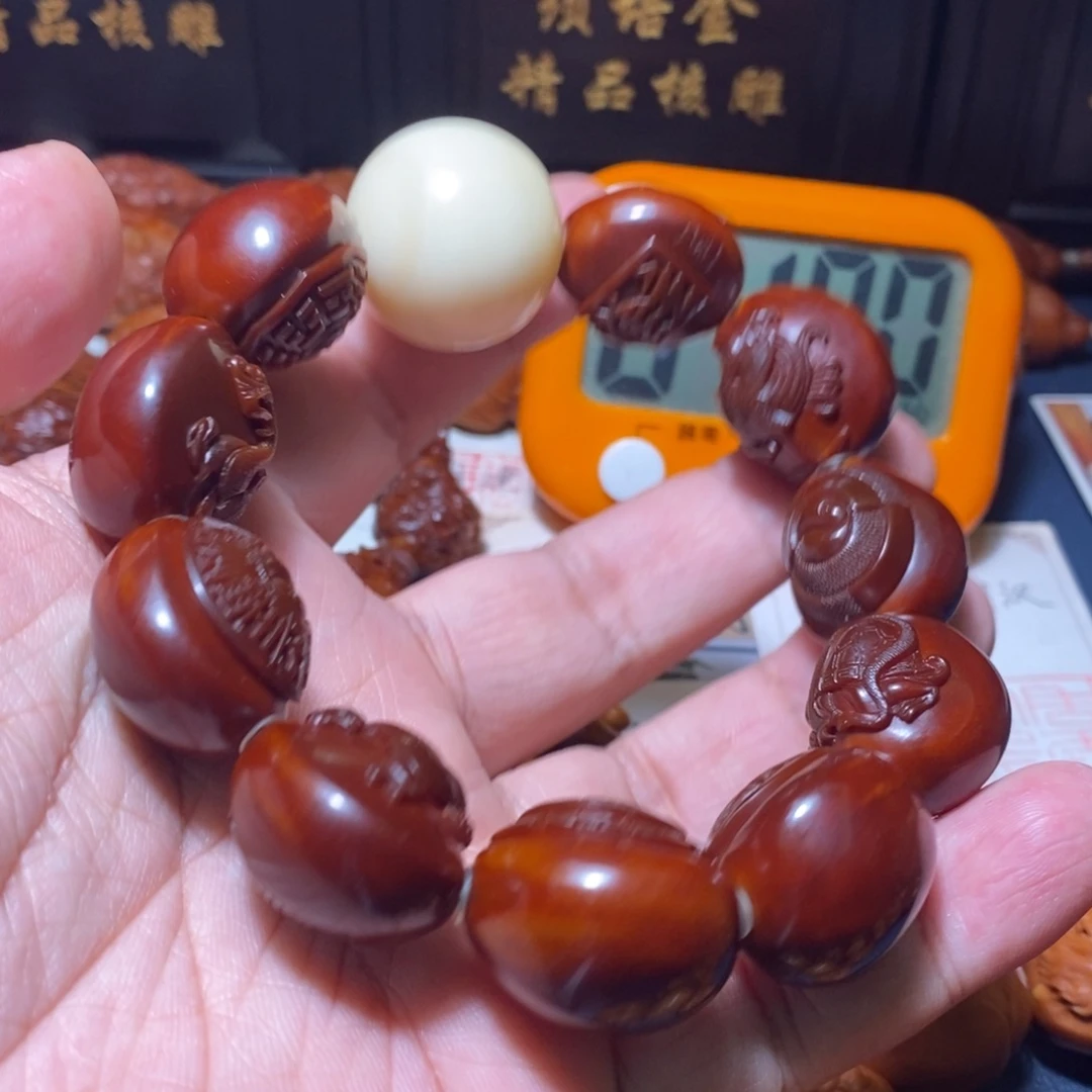 诺***哥橄榄核手串/手链觅核链接