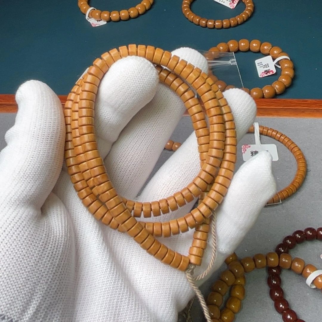 紫金鼠手串田***酷63药片长串