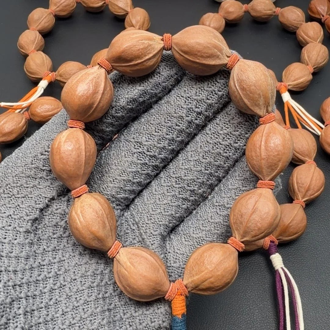 橄榄核手串1.9*2.5 原生态梅林铁核