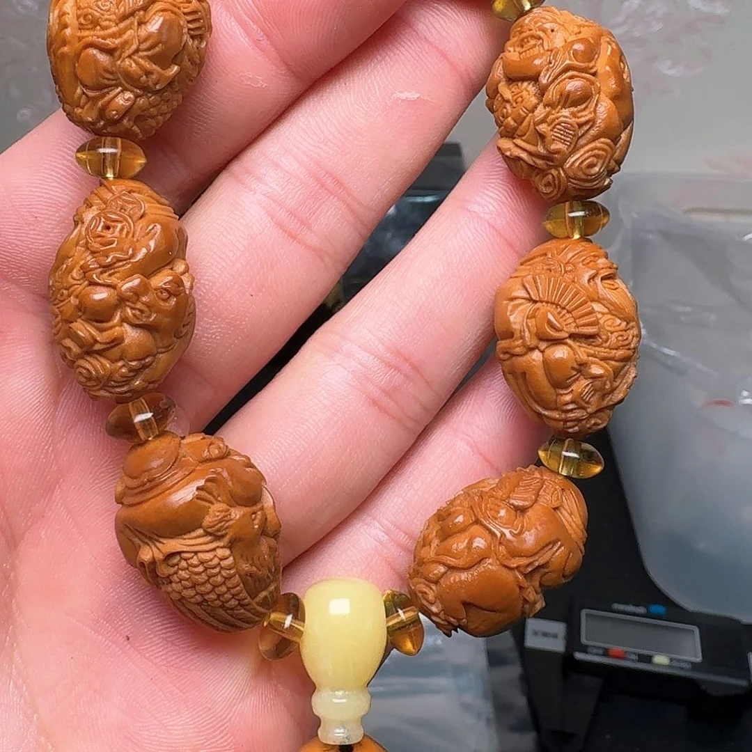 橄榄核手串饭局多