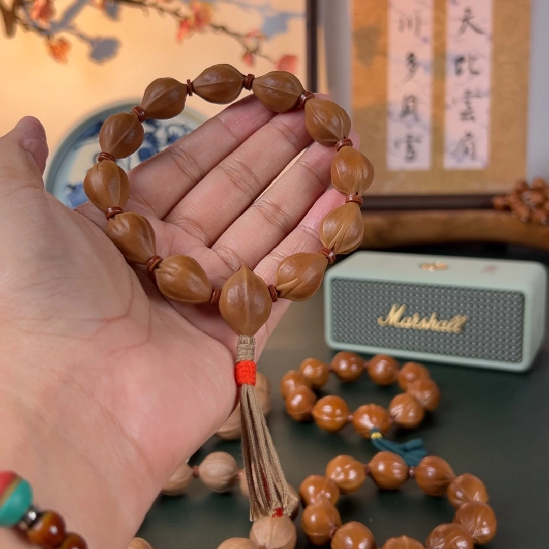M***店橄榄核手串15×21三面佛