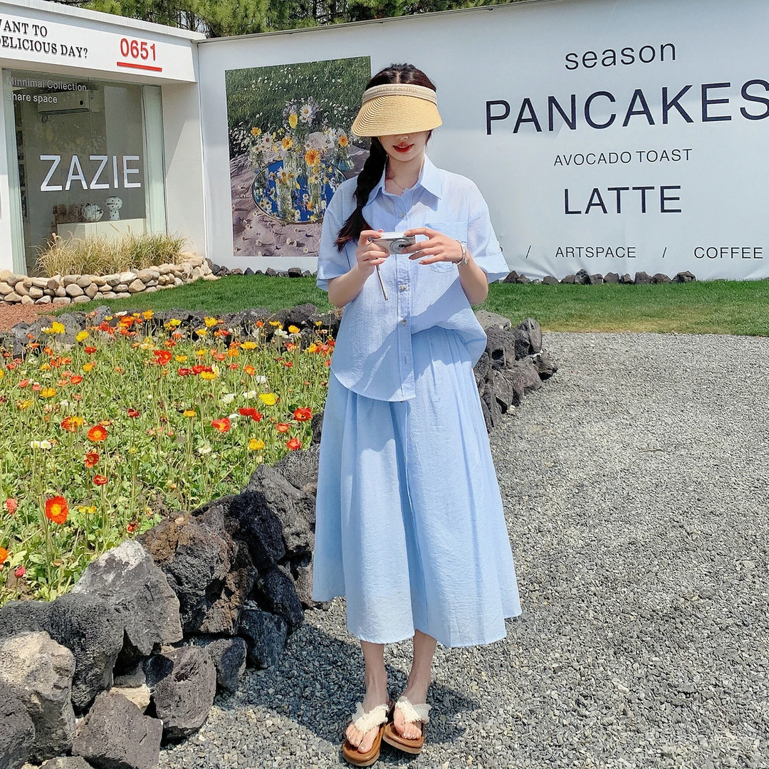 蓝色松弛感穿搭衬衫套装裙女2025年新款夏日绝美休闲半身裙两件套