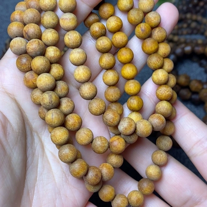 陆*贡木手串印贡0.8黄年糕