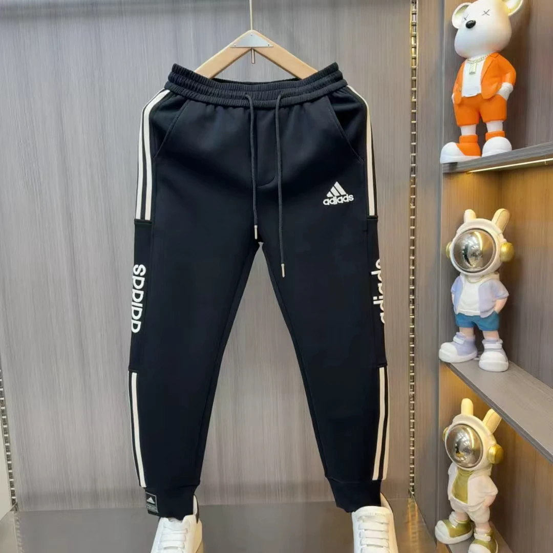 秋冬新款潮流刺绣加绒加厚弹力小脚运动长裤男士休闲裤男卫裤5512