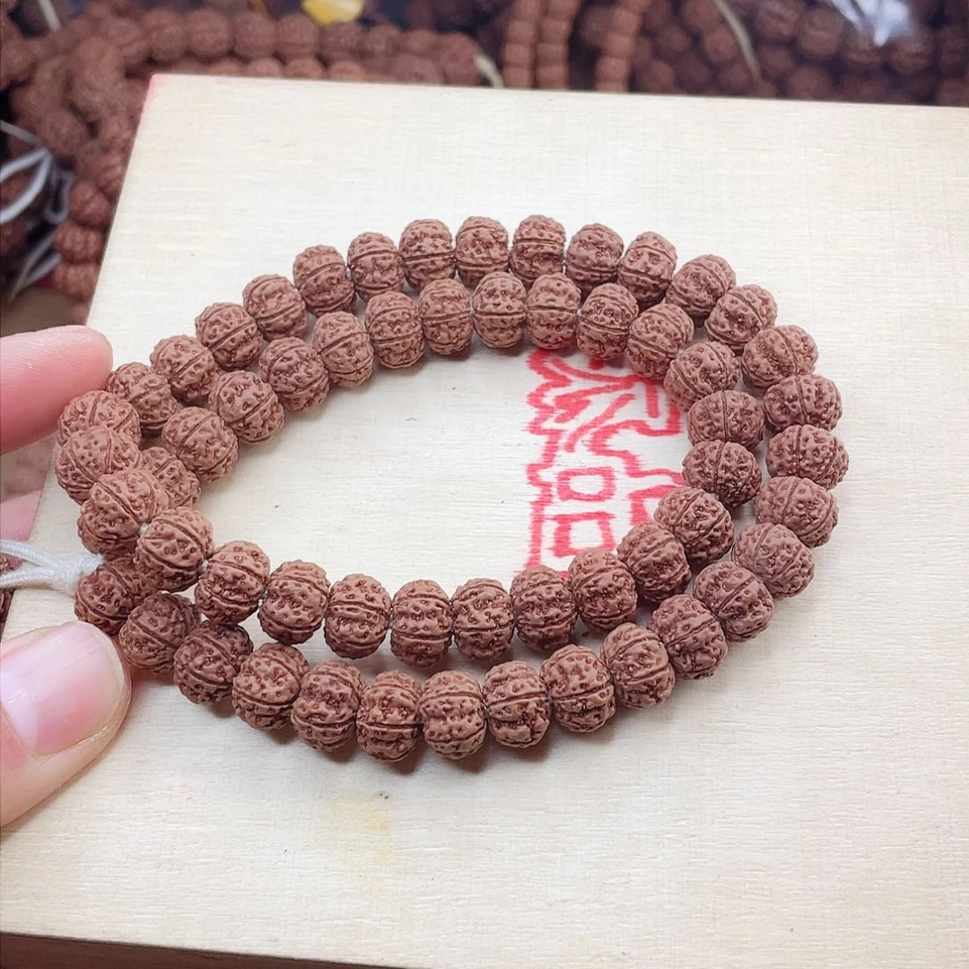 金刚菩提手串见*哥六瓣双全毕业级凹底梅花，纯天然原皮