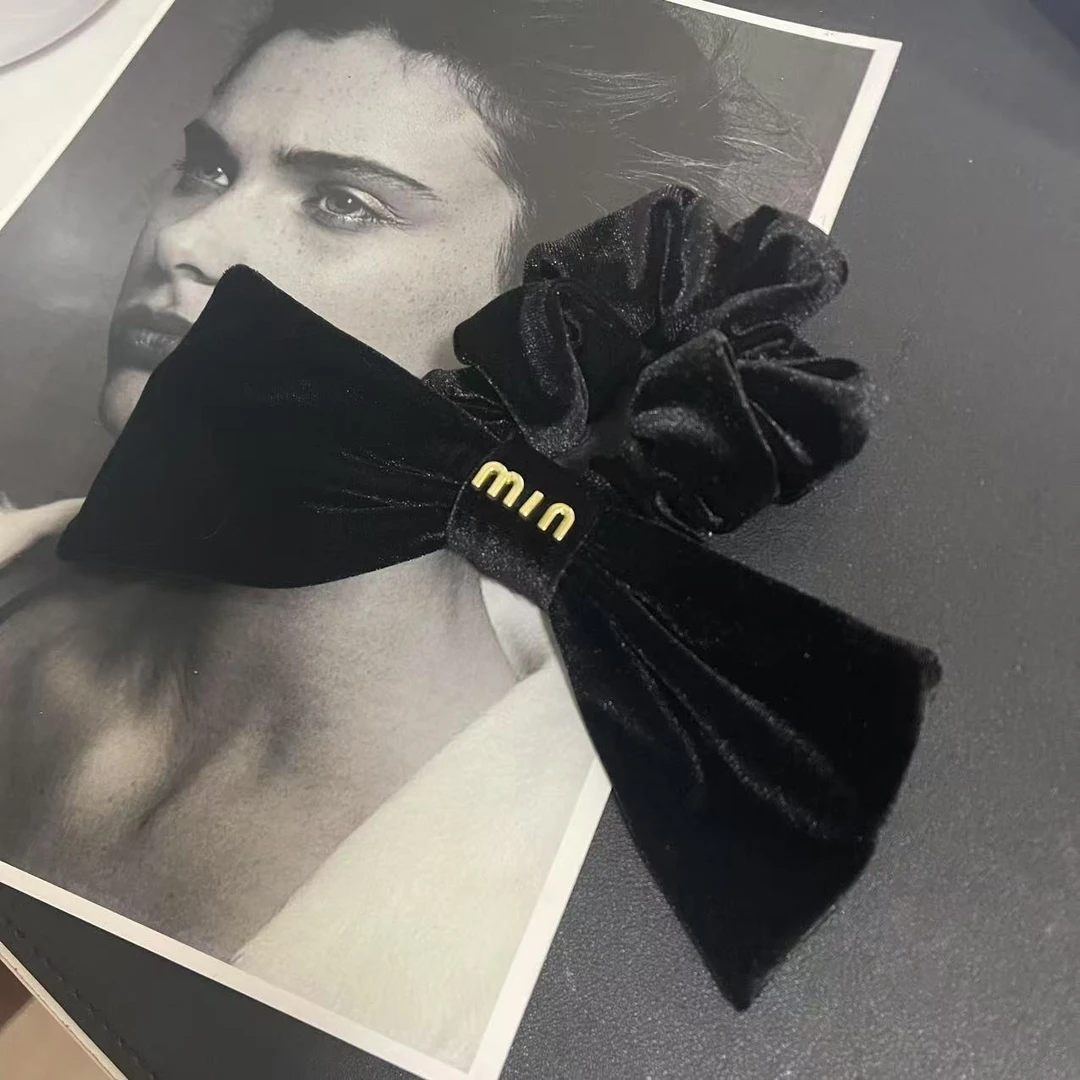 牛牛黑色丝绒蝴蝶结发圈