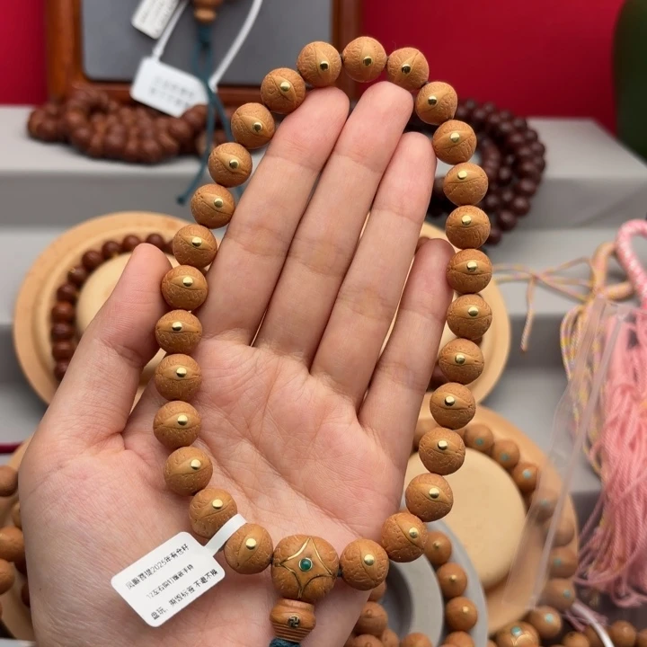 啦***啦手串凤眼菩提12左右铜钉镶嵌手持