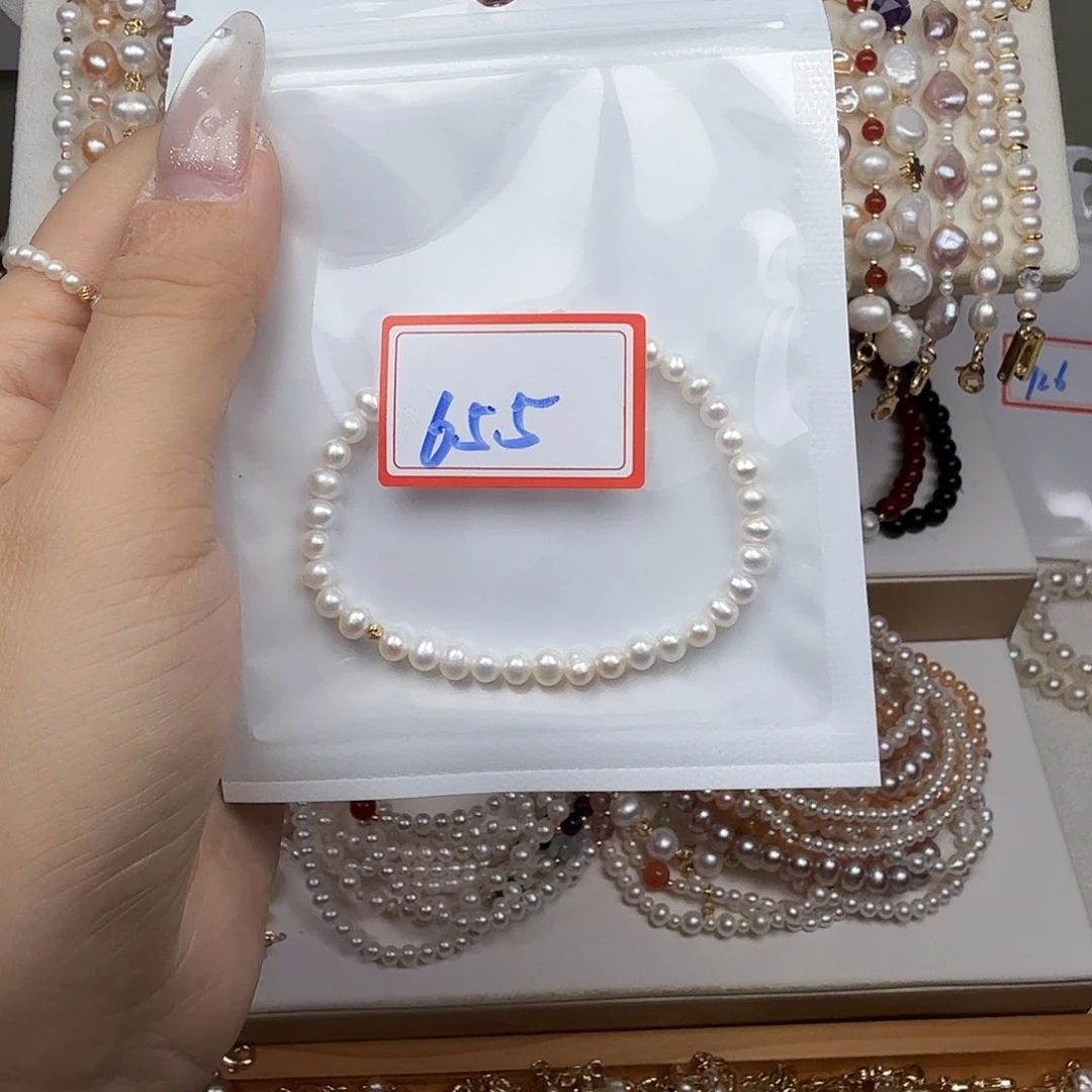ƪ***雅钛钢手绳淡水珍珠