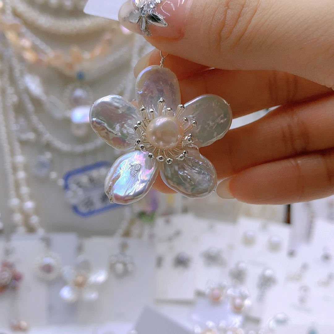 银S925镶嵌耳饰淡水珍珠b***n