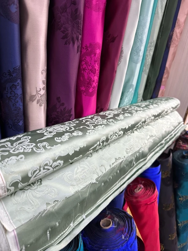 姆米花萝提花真丝弹力缎桑真丝布料可用于蒙古袍袍制作