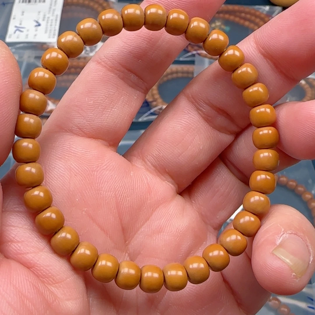 橄榄核手串老挝SS级核尖极限弧尺寸6.7全无白福利