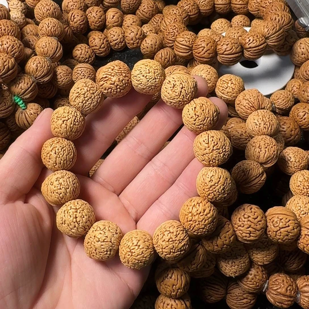 非***收吊坠桃核凤尾手串