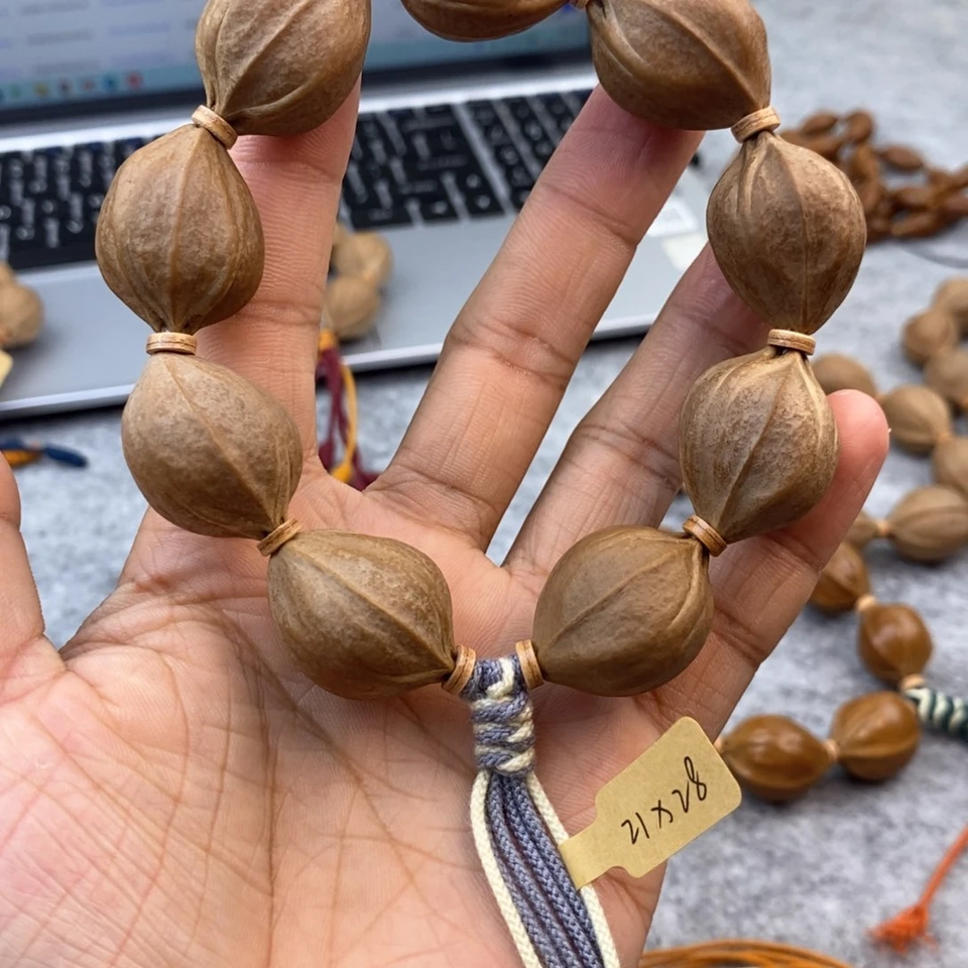 橄榄核手串/手链浮*21/28大四花