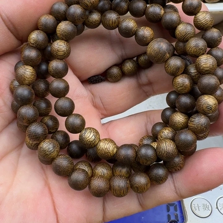 荣***哥沉香手串张勺子手串16克加