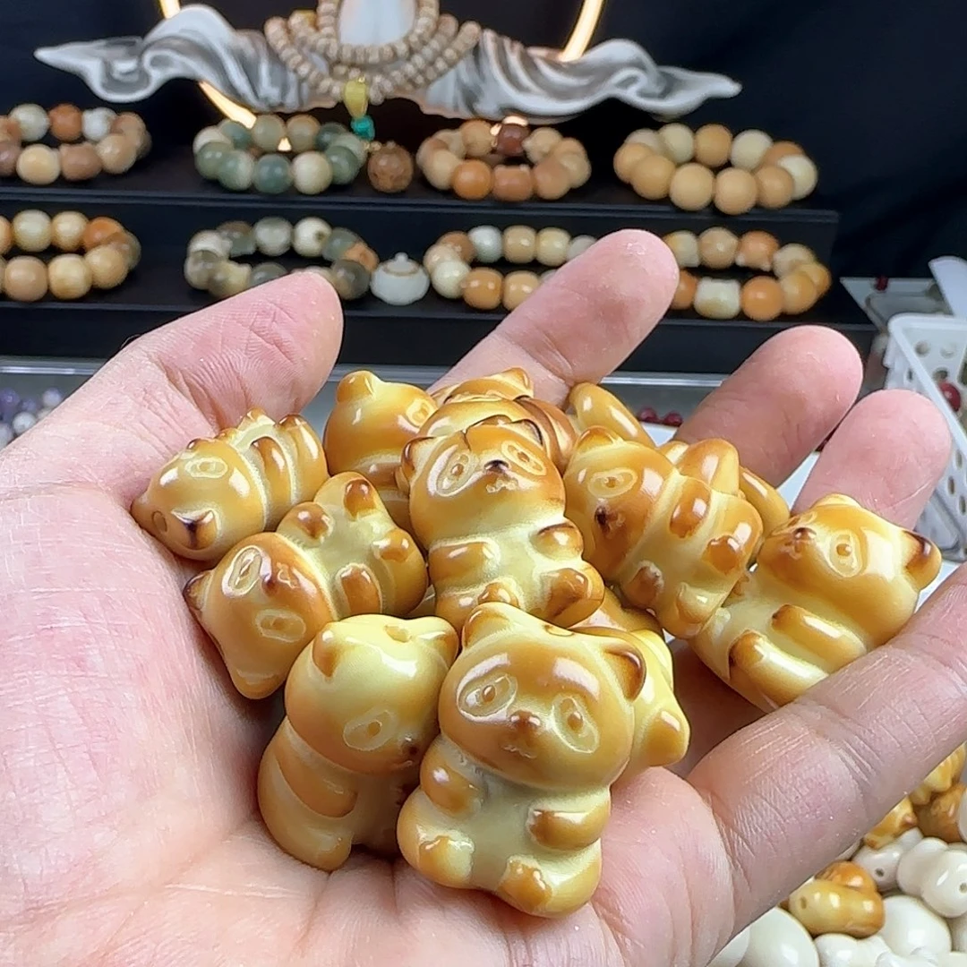 菩提根/象牙果手串瑕疵炭烧熊猫4颗不挑瑕有裂