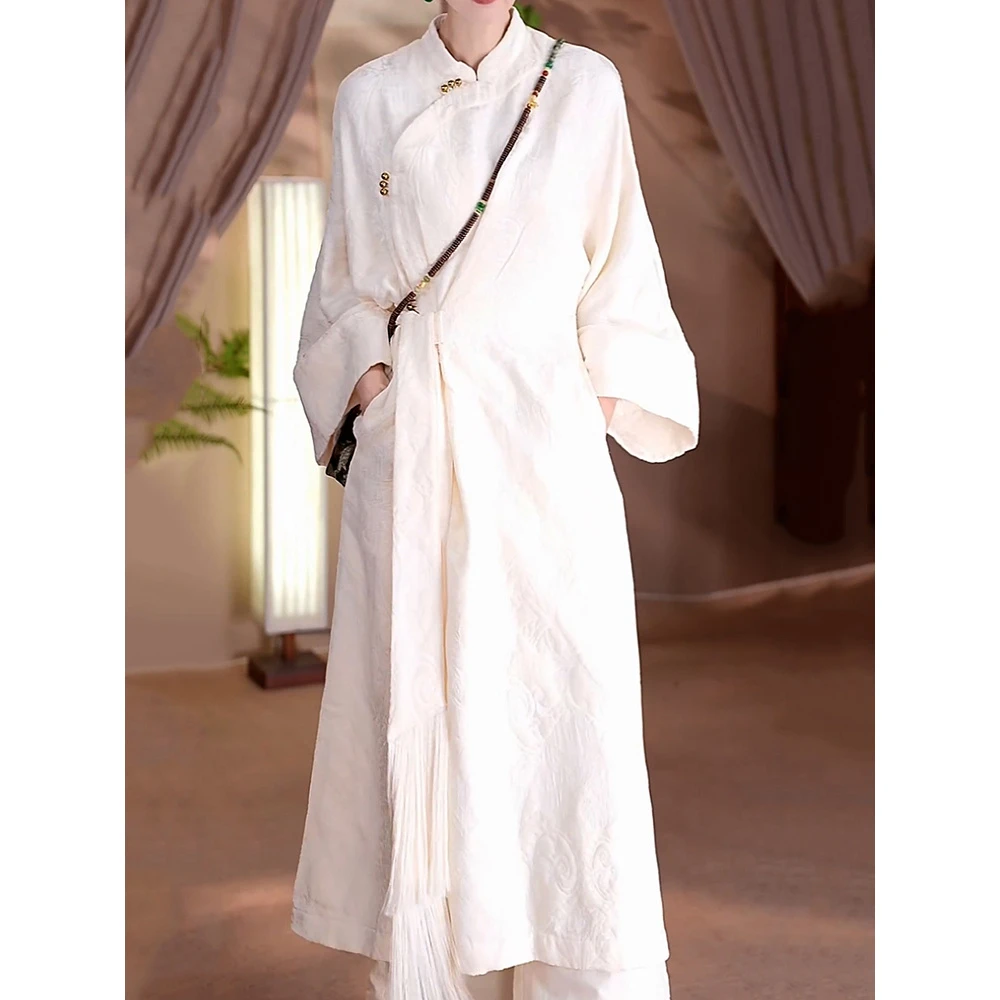 超仙白色收腰显瘦A字裙女2025秋季新款文艺风提花立领高级感长裙