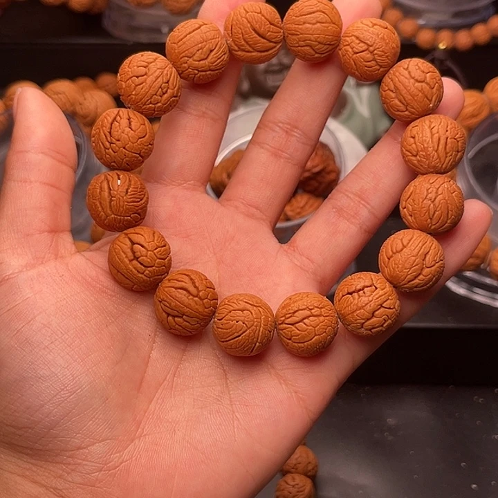 手串桃核金丝龙珠1.6