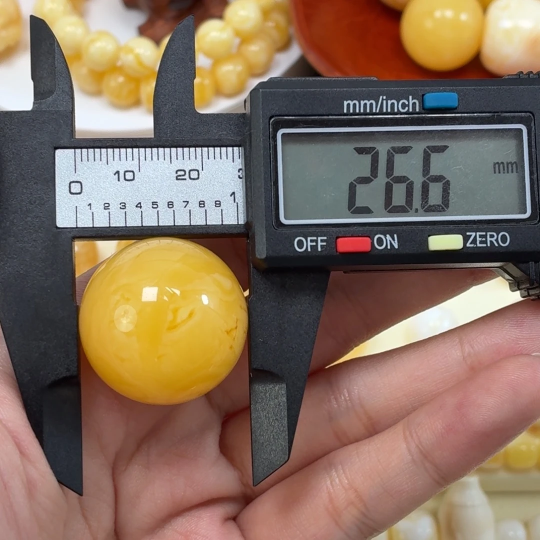 琥珀未镶嵌珠宝奇石焦皮鸡油红圆珠26.6mm